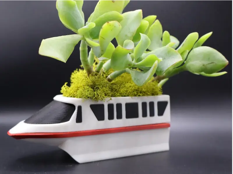 Red Monorail Planter With Plants Side View